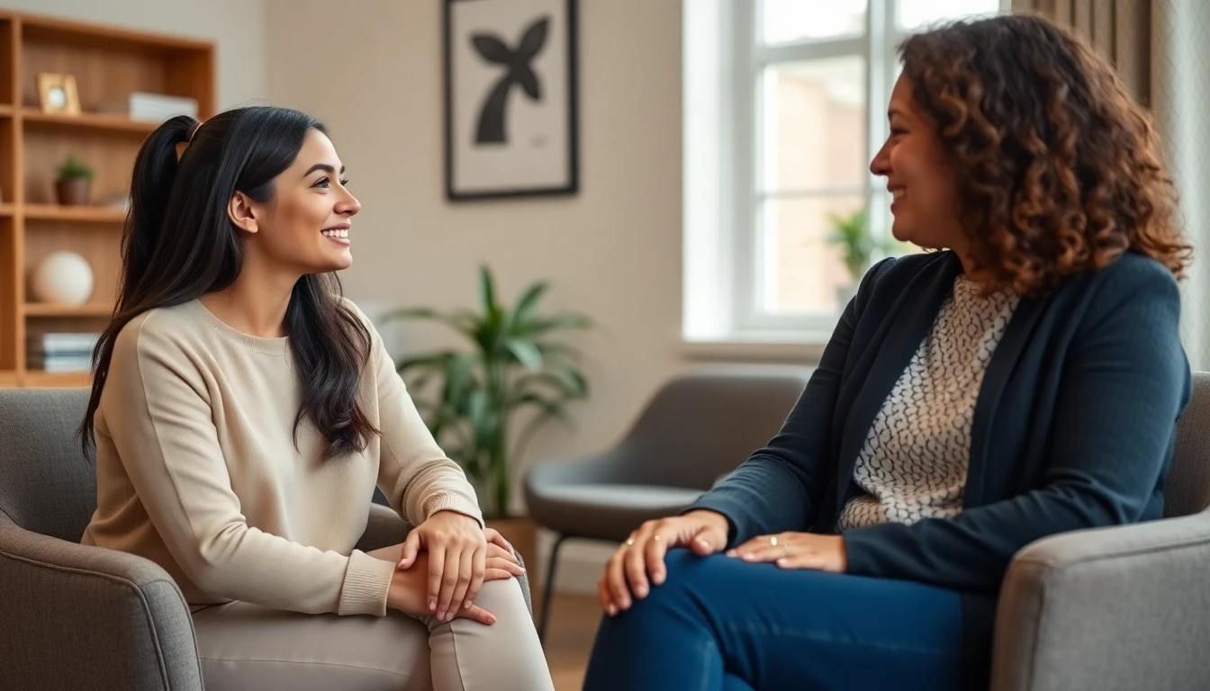 An expectant mother and a counselor talking one on one in a warm, comfortable office